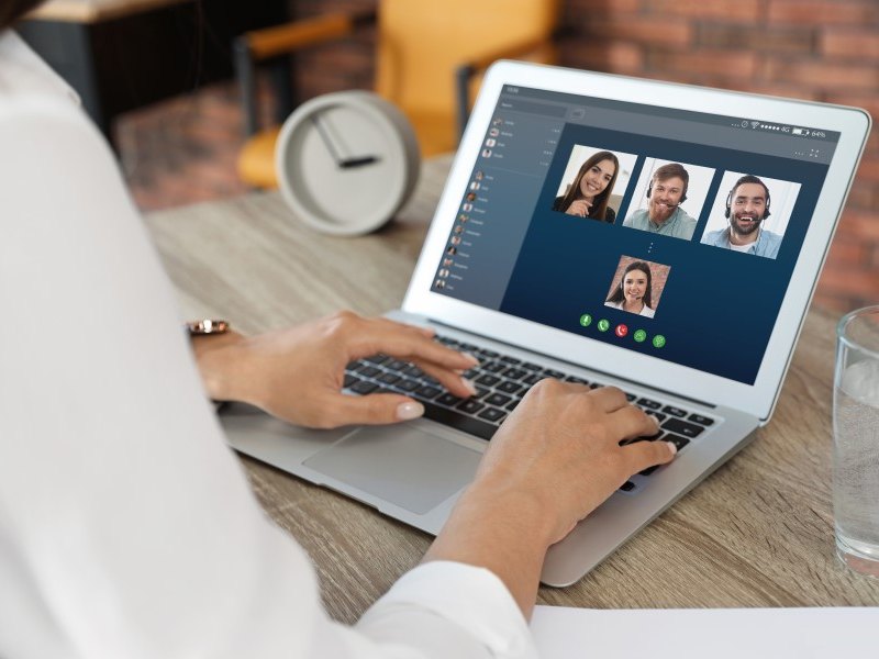 A participant speaking during a live video session with other members of the group on screen
